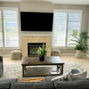 Modern San Diego living! Sleek shutters for a stylish & sun-drenched living room.